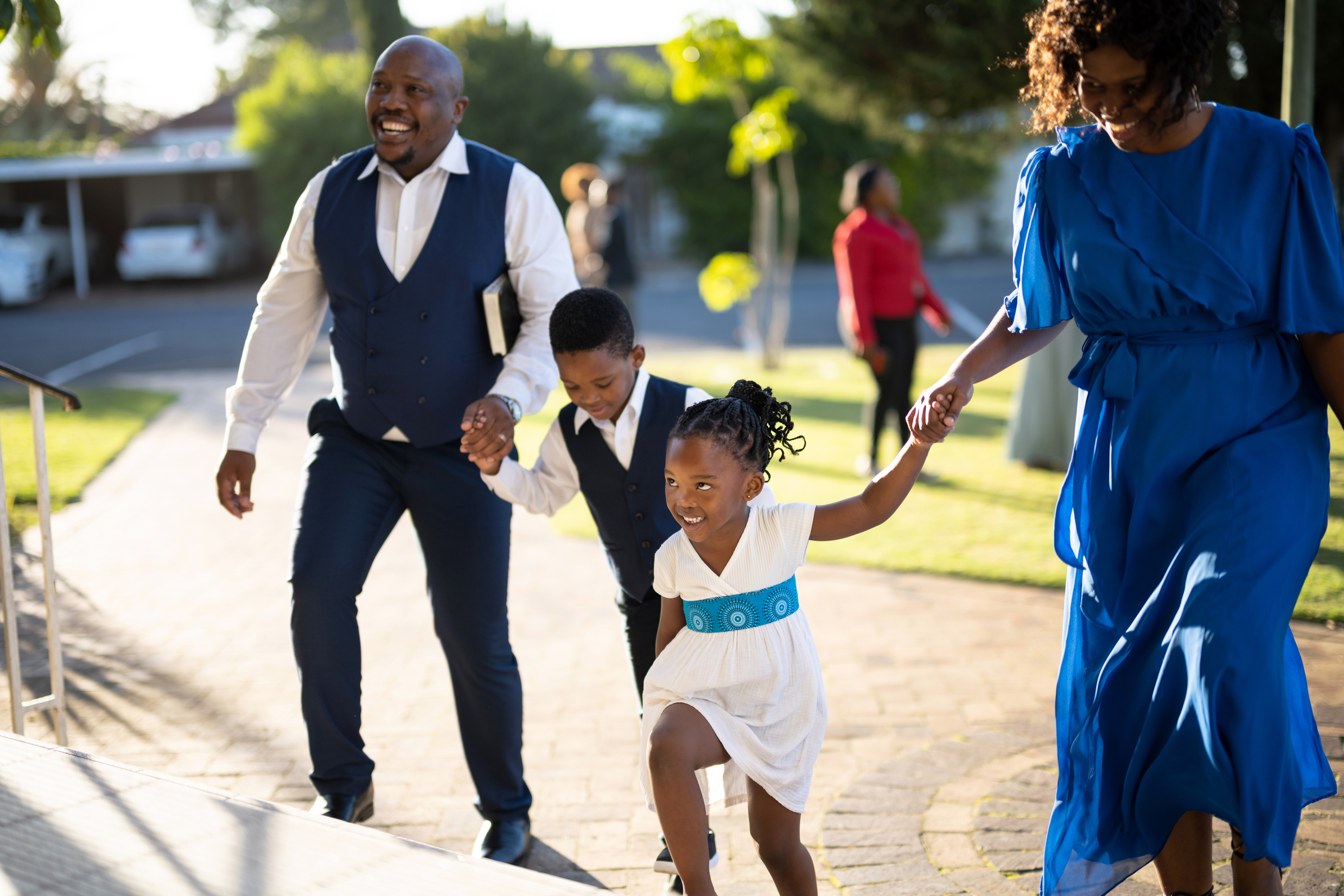 family arriving at church